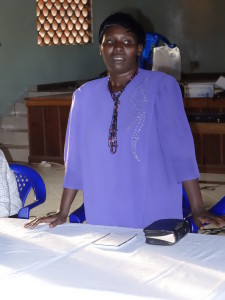 Mrs.Florence addressing the married couples at Old Kampala